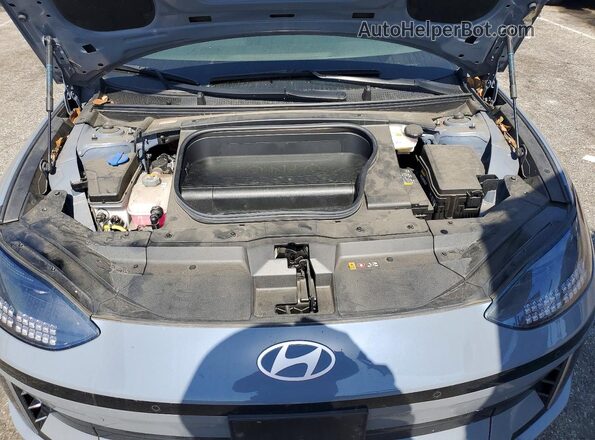 KMHM34AA0PA021048 2023 HYUNDAI IONIQ Gray Vista interior trasera