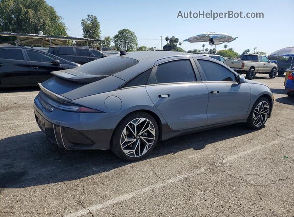 KMHM34AA0PA021048 2023 HYUNDAI IONIQ Gray Trasero derecho