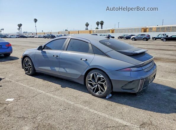 KMHM34AA0PA021048 2023 HYUNDAI IONIQ Gray Trasero izquierdo