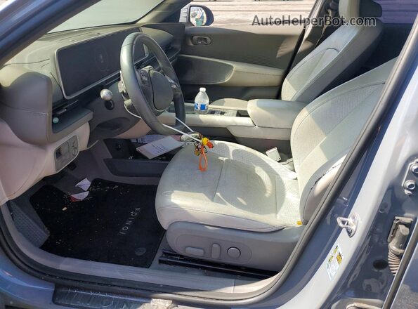 KMHM34AA0PA021048 2023 HYUNDAI IONIQ Gray Vista interior delantera