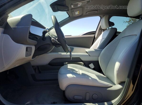 KMHM34AA1SA114573 2025 HYUNDAI IONIQ Черный Вид салона спереди
