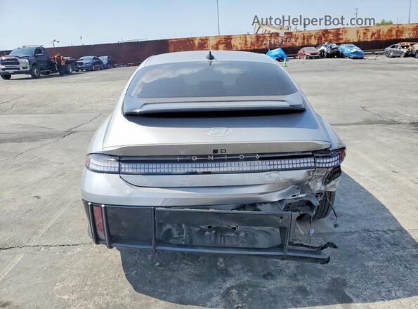 KMHM34AA4PA033736 2023 HYUNDAI IONIQ Silver უკანა ხედი
