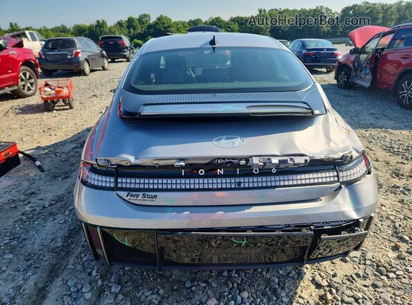 KMHM34AA5PA026598 2023 HYUNDAI IONIQ Серебряный Вид сзади