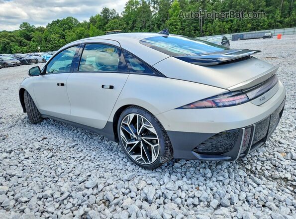 KMHM54AAXPA040572 2023 HYUNDAI IONIQ Серебряный Задняя левая четверть