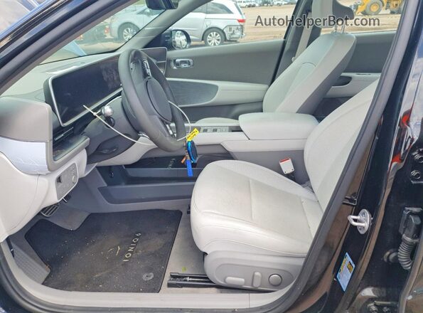 KMHM54AC5PA019565 2023 HYUNDAI IONIQ Black Vista interior delantera
