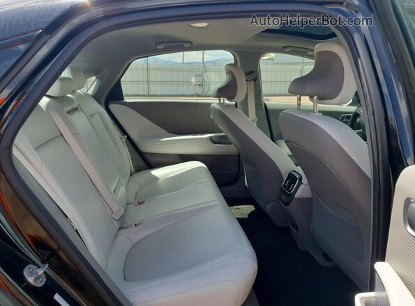 KMHM54AC5PA019565 2023 HYUNDAI IONIQ Black Vista de los asientos traseros
