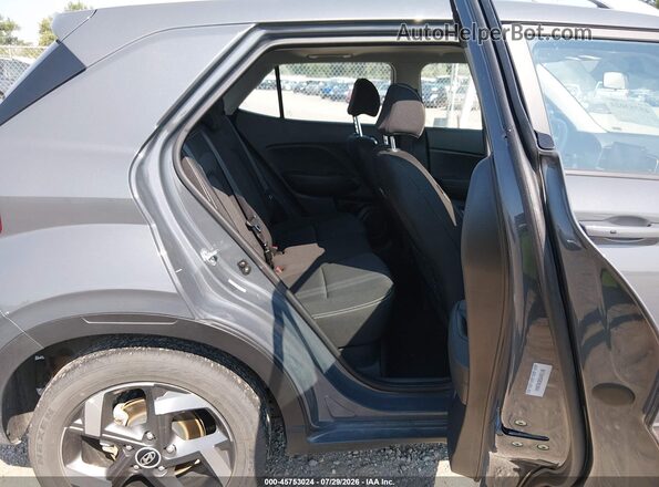 KMHRC8A30SU403148 2025 HYUNDAI VENUE Gray Widok naklejki z numerem VIN