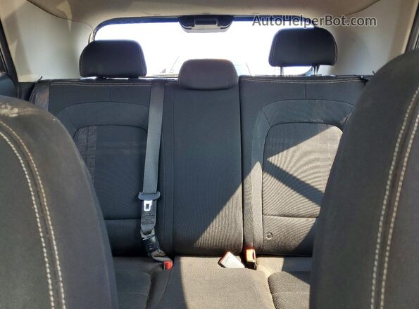 KMHRC8A34LU019553 2020 HYUNDAI VENUE Black Rear seats view
