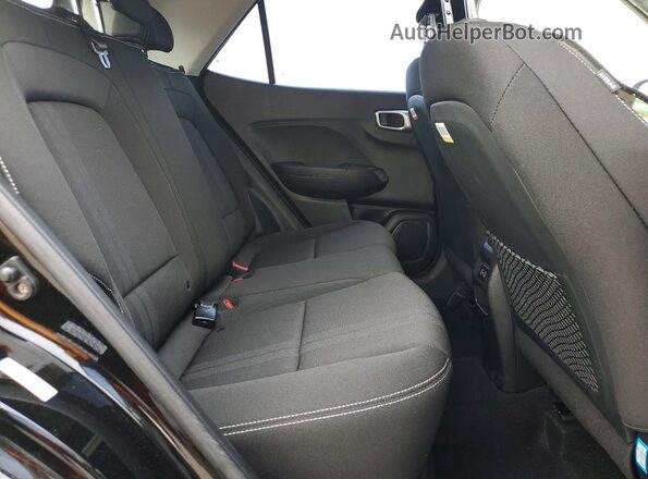 KMHRC8A35RU317070 2024 HYUNDAI VENUE Black Vista interior trasera