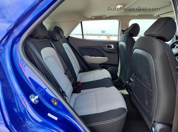 KMHRC8A38RU323879 2024 HYUNDAI VENUE Blue Вид задньої частини салону