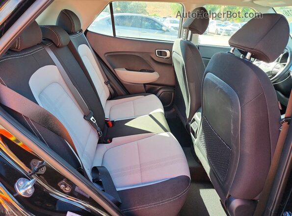 KMHRC8A39SU346268 2025 HYUNDAI VENUE Black Rear interior view