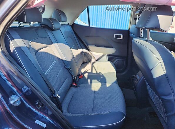 KMHRC8A39TU424856 2026 HYUNDAI VENUE Blue Rear interior view