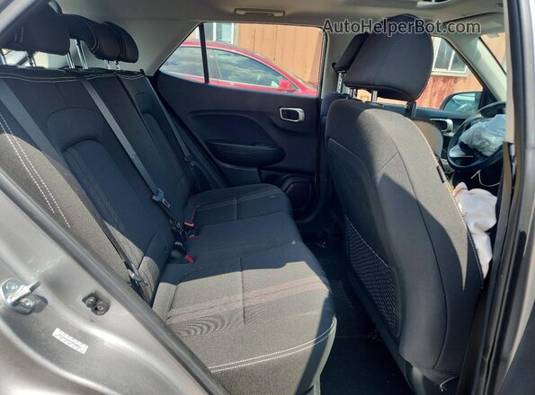 KMHRC8A3XPU257283 2023 HYUNDAI VENUE Silver Rear seats view