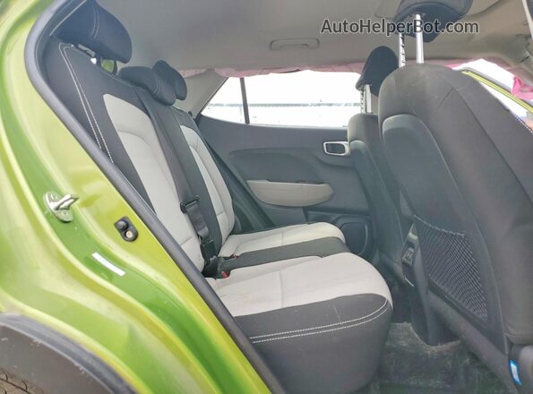 KMHRC8A3XRU304377 2024 HYUNDAI VENUE Green უკანა სალონის ხედი