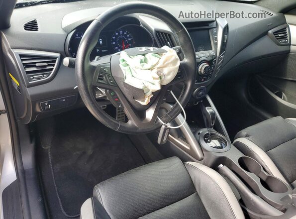 KMHTC6AE0GU261757 2016 HYUNDAI VELOSTER Серебряный Вид панели приборов