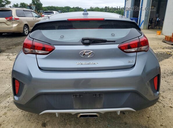 KMHTG6AF1KU017962 2019 HYUNDAI VELOSTER Серебряный Вид сзади