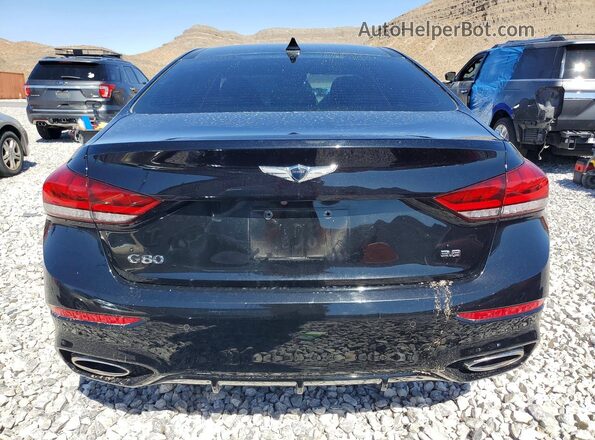 KMTFN4JE7LU335073 2020 GENESIS G80 Black Vista trasera