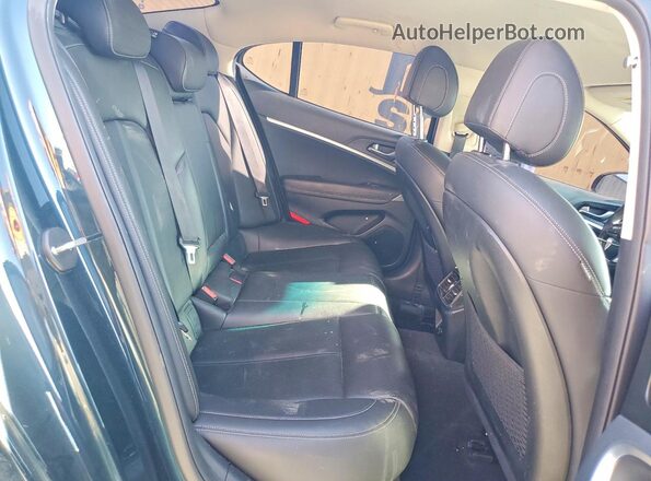 KMTG34TA2PU123644 2023 GENESIS G70 Green Rear seats view
