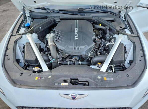 KMTG54TEXPU104935 2023 GENESIS G70 Серебряный Вид задней части салона