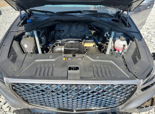 KMUMADTB5NU045175 2022 GENESIS GV70 Silver Rear interior view