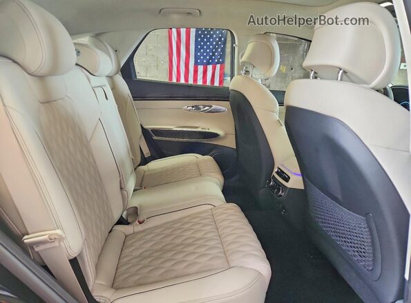 KMUMCDTC0PU133346 2023 GENESIS GV70 Black Vista interior trasera