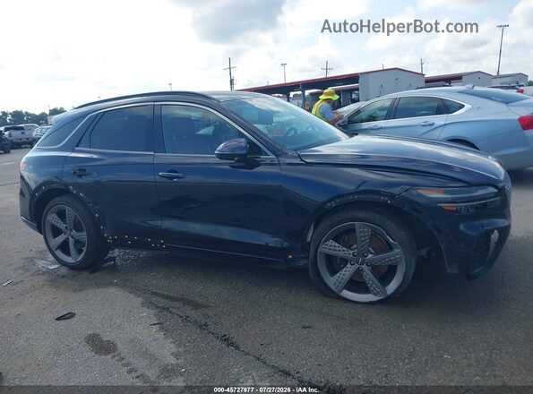 KMUMCDTC3PU110272 2023 GENESIS GV70 Синий Вид задней части салона