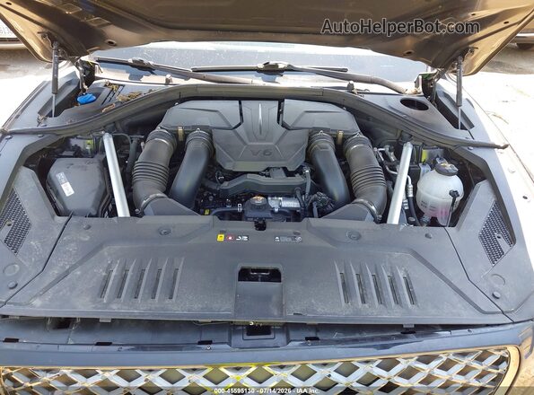 KMUMCDTC8SU206696 2025 GENESIS GV70 Black Rear view