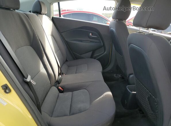 KNADM4A32G6000883 2016 KIA RIO Yellow Rear seats view
