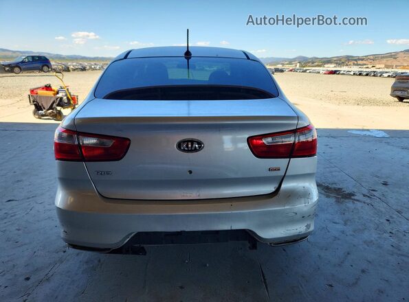 KNADM4A34G6637063 2016 KIA RIO Silver Вид ззаду
