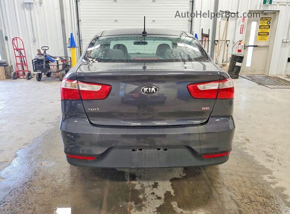 KNADM4A35H6100218 2017 KIA RIO Charcoal Հետևի տեսք
