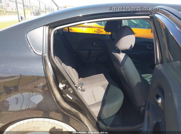 KNADM4A36H6049778 2017 KIA RIO Black Vista de la etiqueta del VIN