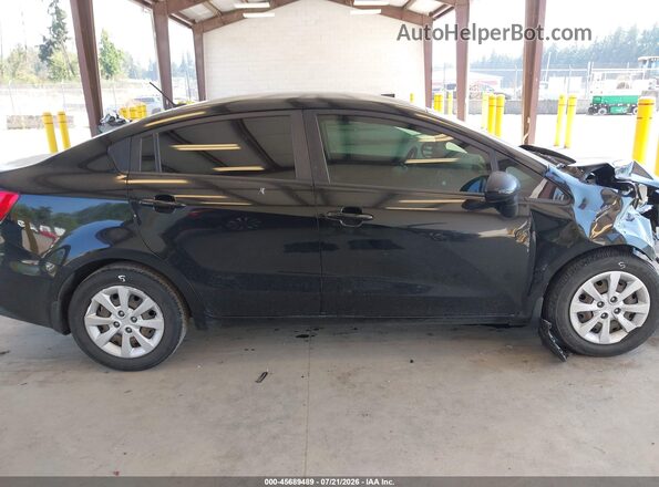 KNADM4A36H6057461 2017 KIA RIO Black Vista interior trasera
