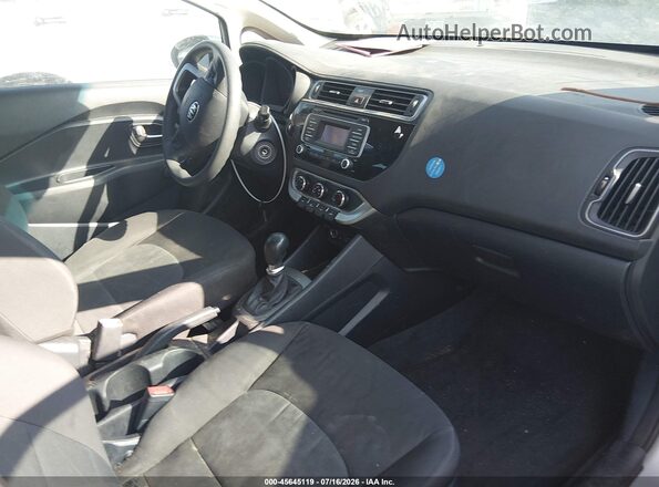 KNADM4A39H6011221 2017 KIA RIO Silver Front interior view