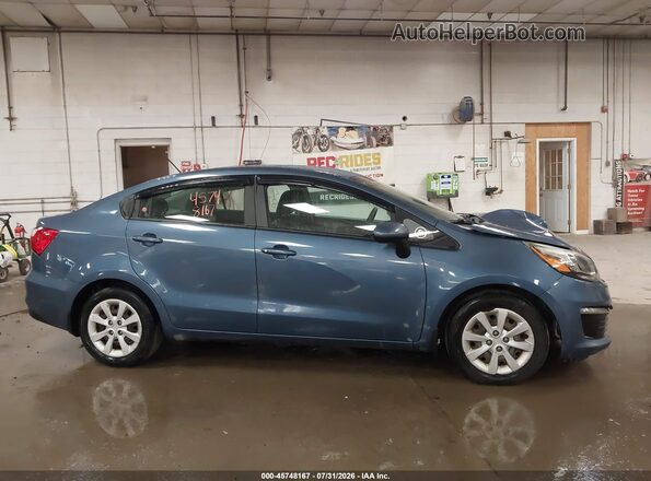 KNADM4A3XG6646978 2016 KIA RIO Blue Rear interior view