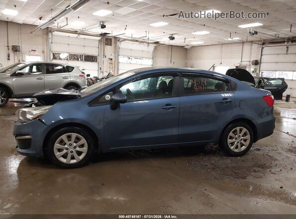 KNADM4A3XG6646978 2016 KIA RIO Blue 360 interior view