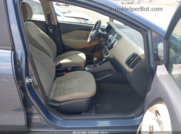 KNADM5A34G6640048 2016 KIA RIO Blue Вид салону спереду