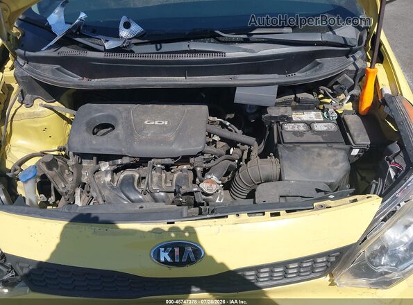 KNADM5A39G6678598 2016 KIA RIO Yellow Vista trasera