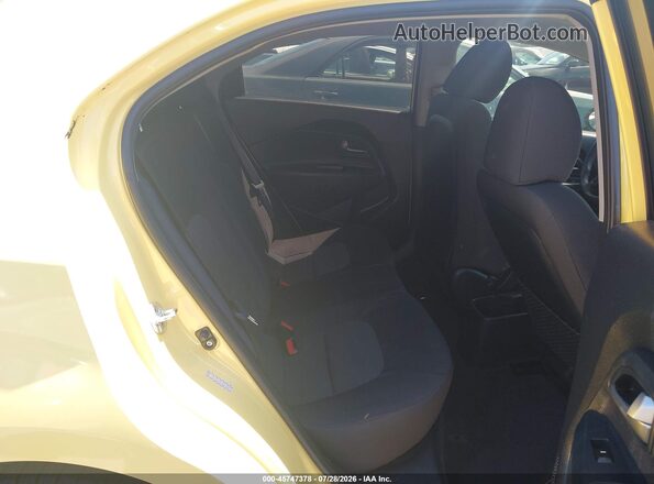 KNADM5A39G6678598 2016 KIA RIO Yellow Vista de la etiqueta del VIN