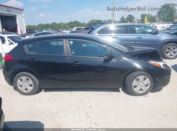 KNAFK5A84H5697383 2017 KIA FORTE Black უკანა სალონის ხედი