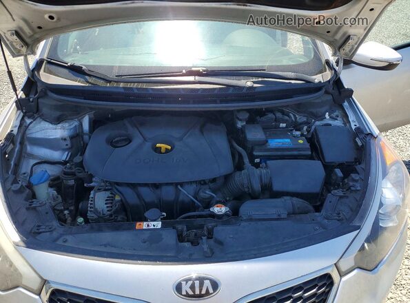 KNAFX4A6XG5446229 2016 KIA FORTE Серебряный Вид задней части салона