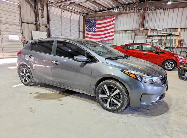 KNAFX5A81H5721138 2017 KIA FORTE Gray Delantero derecho