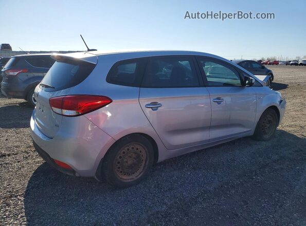 KNAHT8A34G7130685 2016 KIA RONDO Серебряный Задняя правая четверть