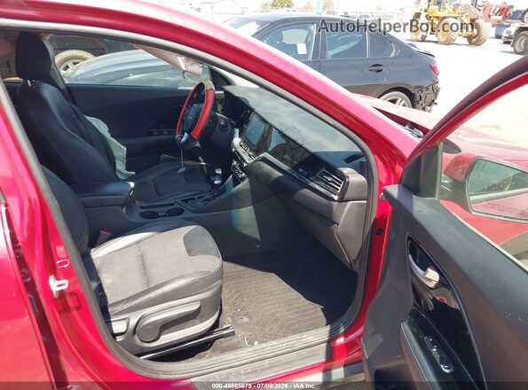 KNDCB3LC3N5541536 2022 KIA NIRO Красный Вид салона спереди