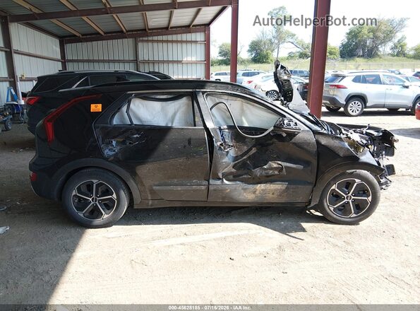 KNDCP3LE6R5132701 2024 KIA NIRO Черный Вид задней части салона