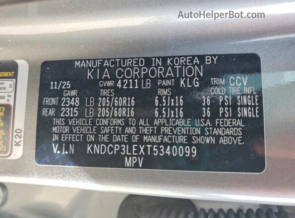 KNDCP3LEXT5340099 2026 KIA NIRO Gray Vista de la etiqueta del VIN