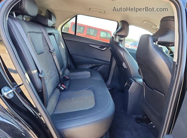KNDCR3L11R5116977 2024 KIA NIRO Black Rear interior view