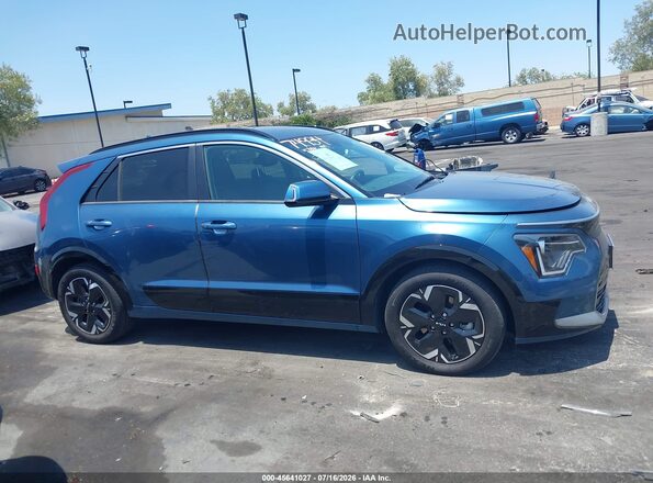 KNDCR3L16P5038774 2023 KIA NIRO EV Blue 360 interior view