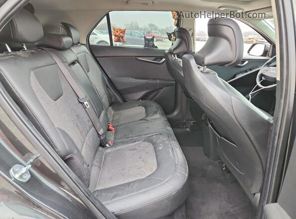 KNDCR3LE1P5042606 2023 KIA NIRO Charcoal Vista interior trasera