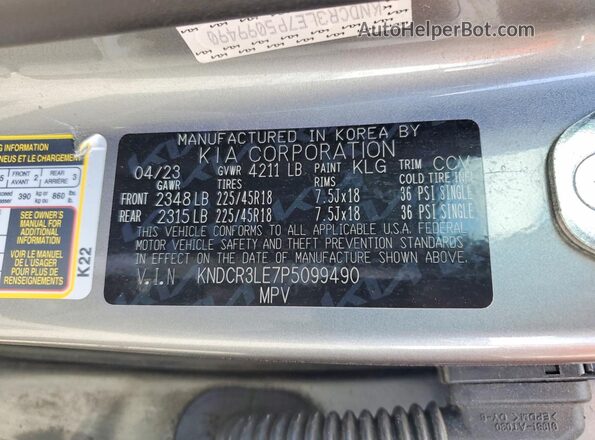 KNDCR3LE7P5099490 2023 KIA NIRO Silver VIN կոդի պիտակի տեսք
