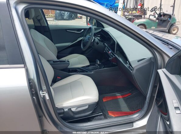 KNDCR3LE9P5059864 2023 KIA NIRO Gray Front interior view